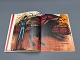 an open book with a picture of a bull and a man in a blue suit