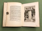 an open book with a picture of a group of people on it