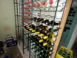 many bottles of wine on the shelves in the room