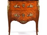 une image d'une commode avec un plateau en marbre