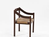 a wooden chair with a wooden seat on a white background