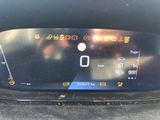 the dashboard of a car with a digital display on it ' s dashboard