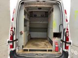 a white van with a bed in the back of it
