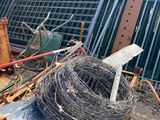 a pile of wires and other junk on the ground