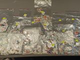 a table that has many bags of items on it