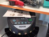 a shelf with a lot of electronic items on it