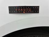 a close up of a sticker on a car ' s bumper