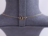a close up of a necklace on a mannequin neck