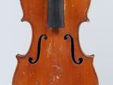 an old violin with a black bow on a white background