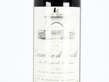 a bottle of wine that is sitting on a table