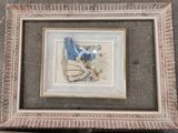a picture of a picture of a blue bird in a picture frame