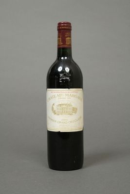 a bottle of wine that is sitting on a table