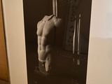black and white photograph of a naked man in a bathroom