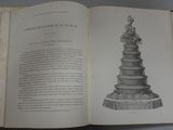 an open book with a drawing of a cake on it