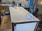 a table that is sitting in the middle of a room