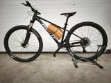 a bike that is parked in front of a garage door