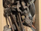 a cardboard box filled with a lot of old items