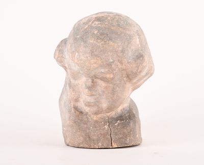 statue of a man ' s head on a white background