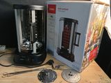 a box of food sitting on a table next to a blender