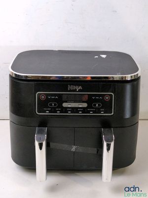 an image of a black air fryer sitting on top of a counter