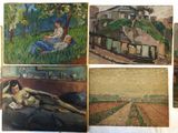 many paintings on the wall of a room