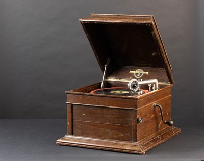 a wooden box with a record player inside of it