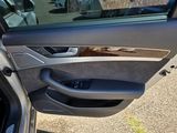 a car door open with the driver ' s side door open
