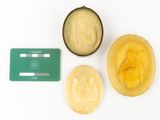 three pieces of fruit and a credit card on the table