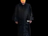 a man in a black robe and hat with a smiley face on his face