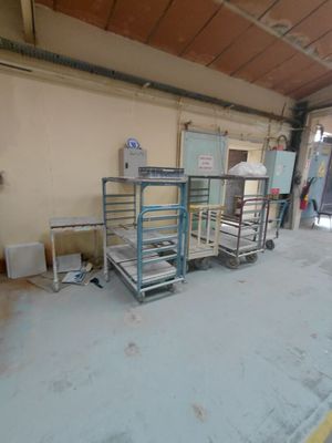 a room that has a bunch of carts in it
