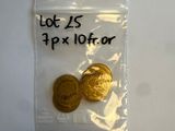 deux pièces d'or dans un sachet en plastique muni d'une étiquette de prix