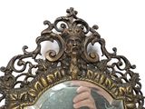 a mirror that has a picture of a person in it
