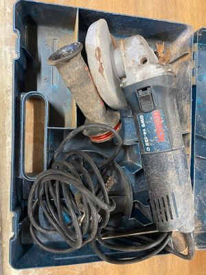 a box with tools in it sitting on a table