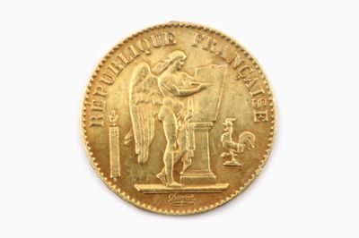 l'image d'une pièce d'or ornée d'un ange