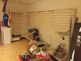 a room with a lot of items on the shelves