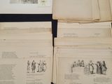 several pages of old books are stacked on a table