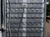 an air conditioner that is sitting outside of a building