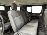 a seat in the back of a van with a bench in it