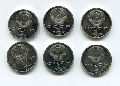 six pièces de monnaie provenant de différents pays sont représentées sur un fond blanc