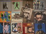 many different types of vinyl records on the wall