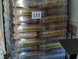 a stack of bread sitting on top of a pallet