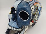 an image of a skull made out of paper maching