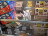 a display case with many boxes of food inside of it