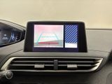 a picture of a car dashboard with a monitor on it