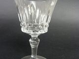 an image of a wine glass on a black table