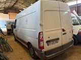 a white van that is parked in a garage