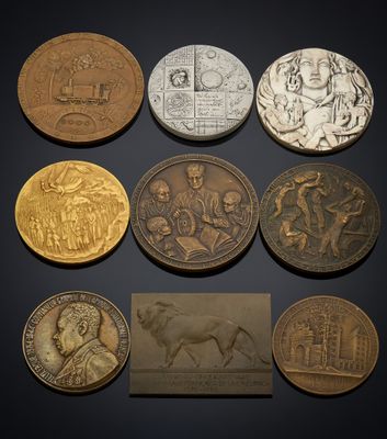 a group of six coins with different designs on them