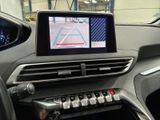 a picture of a car dashboard with a monitor on it