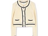 cream cardigan sweater with black trim and buttons