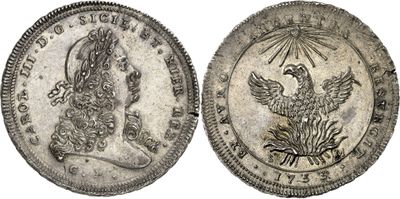 a silver coin with a bird on the front and a bird on the back